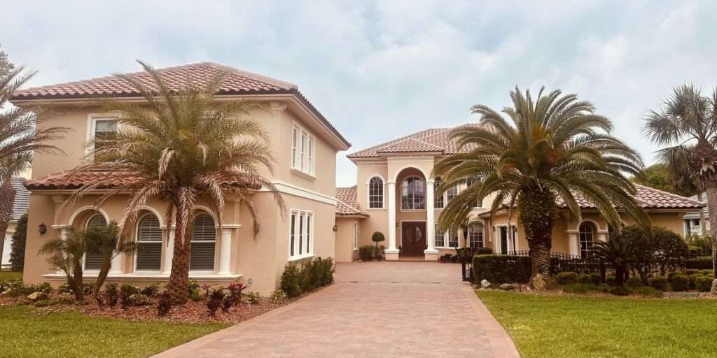 Exterior house painting project in Island Estates, Palm Coast, Florida by First Class Painting & Gator Coating
