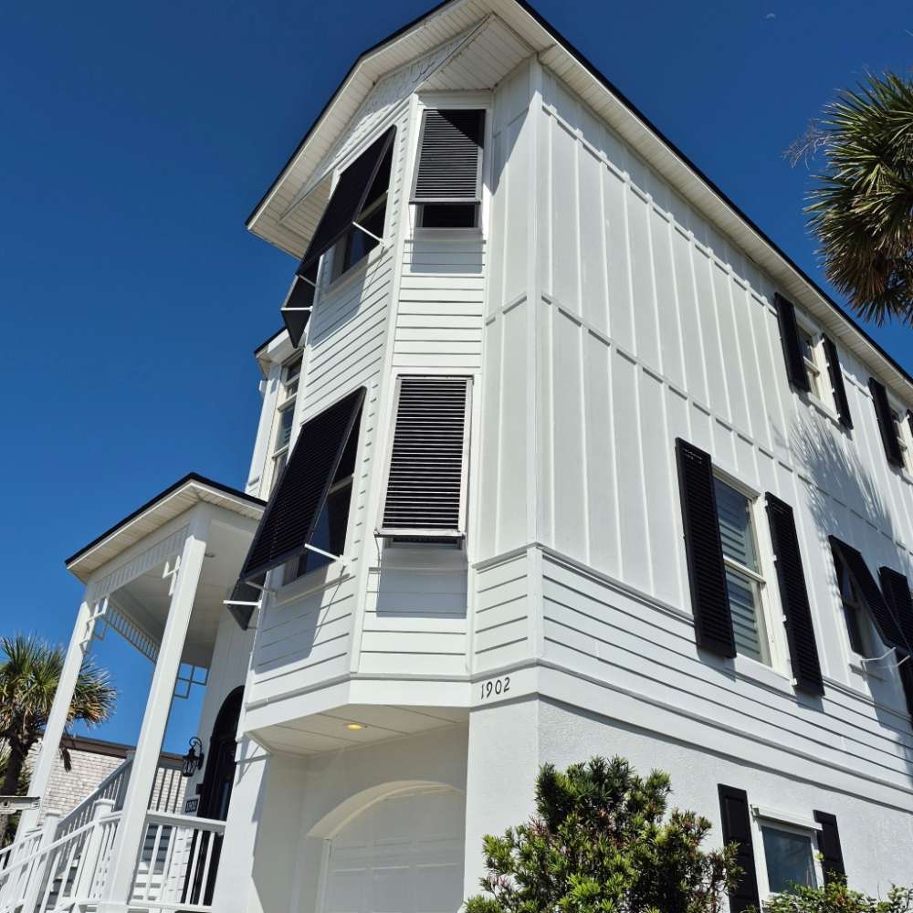 Luxury exterior house painting project by First Class Painting & Gator Coating