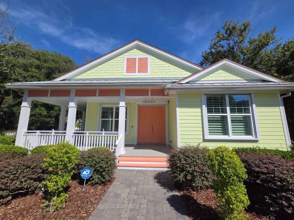 Coastal home exterior with fresh siding, trim and accent colors in Palm Coast